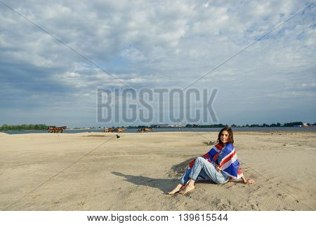 portrait girl the beach dawn she denim overalls white t-shirt British moisture