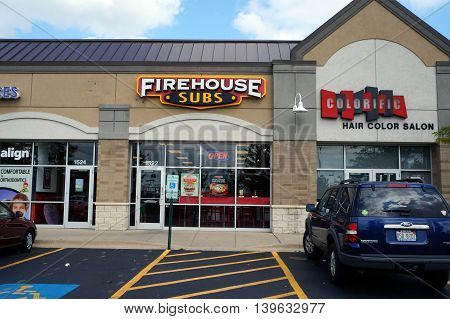 JOLIET, ILLINOIS / UNITED STATES - AUGUST 30, 2015: One may eat sandwiches at the Firehouse Subs restaurant, in a Joliet strip mall.