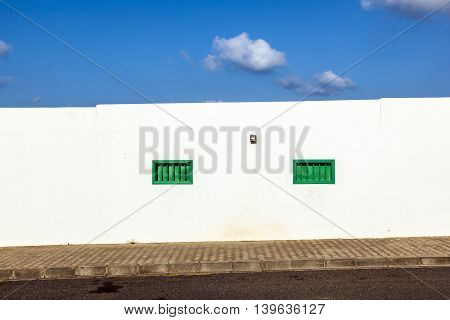 Facade Uf Mediterranean House With Closed Shutterblinds