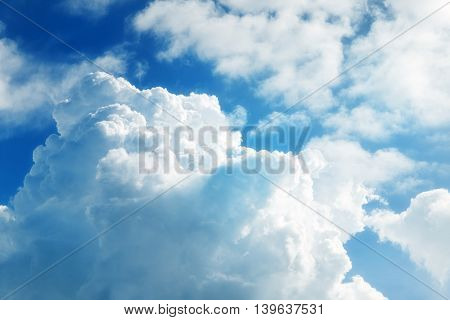 Clouds And A Bright Sun Close Up
