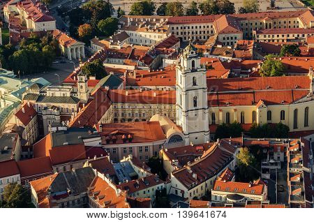 Center part of Vilnius, Lithuania in the sunset. Aerial view from piloted flying object.