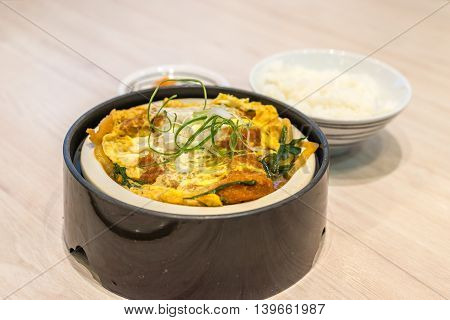 Katsudon - Japanese Breaded Deep Fried Pork Cutlet (tonkatsu) Topped With Egg.