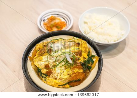 Katsudon - Japanese Breaded Deep Fried Pork Cutlet (tonkatsu) Topped With Egg.