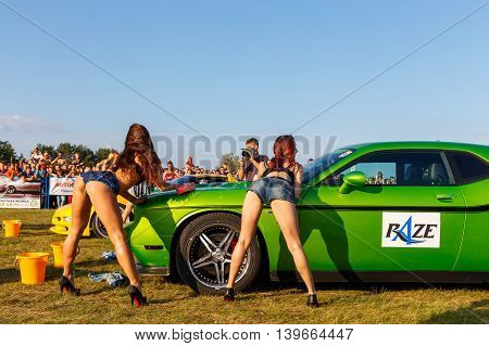 Girls Compete In A Sexy Tank Cars