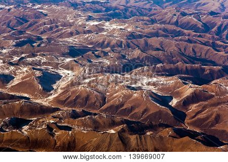 Beautiful View From The Aircraft To The Mountains Of The Himalaya On Chinese Tibetan Side Snow