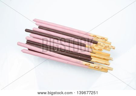 Japanese snack food biscuit stick strawburry coated on white background