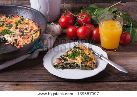 Frittata With Spinach, Tomatoes And Cheese