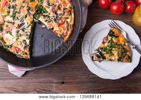 Frittata With Spinach, Tomatoes And Cheese