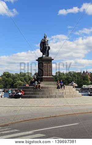 STOCKHOLM, SWEDEN - JUNE 27, 2016: This is monument to King Gustav 3 Skeppsbron on the waterfront near the Royal Palace.