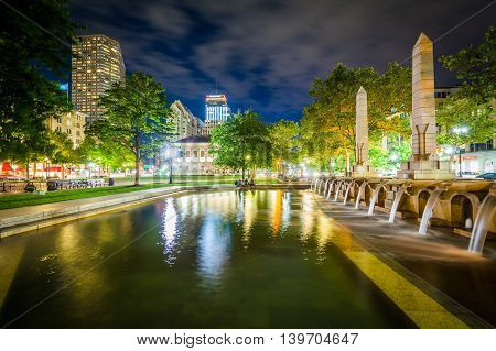 Fountains And Buildings At Copley Square At Night, In Boston, Massachusetts.