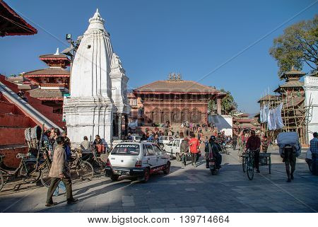 Kathmandu, Nepal -December 28, 2011: People bikes and cars on Hanuman Dhoka square
