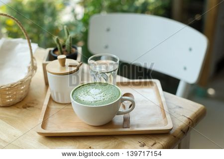 Hot Green Tea Set On A Wooden Table In A Coffeshop