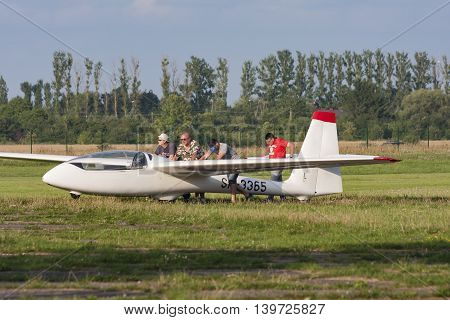 Bialystok Poland July 24 2016: Pilots after landing tow glider hangar