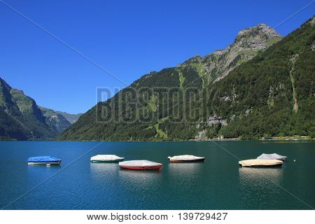 Summer scene at lake Klontal. Mt Mutteristock.