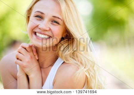 Portrait of happy woman with broad smile