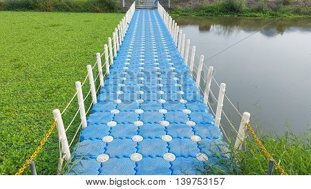 Plastic bridge cross the river is a temporary bridge