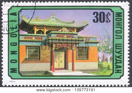 MOSCOW RUSSIA - CIRCA FEBRUARY 2016: a post stamp printed in MONGOLIA shows a traditional Mongolian building the series 