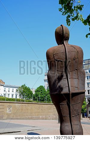 BIRMINGHAM, UNITED KINGDOM - JUNE 6, 2016 - The Iron Man statue by Antony Gormley in Victoria Square Birmingham England UK Western Europe, June 6, 2016.