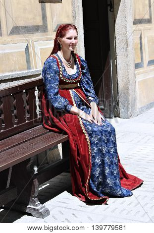 CESKY KRUMLOV, CZECH REPUBLIC - JUNE 18, 2016: Women on Five-petalled Rose Festival on bystreet in Cesky Krumlov