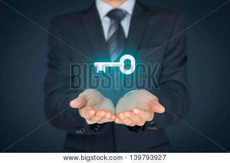 Businessman offer key to success or solution. Turnkey solution and services concept.