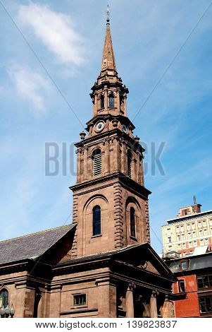 Boston Massachusetts - September7 2009: Spire of the historic 1859 sandstone Arlington Street Church