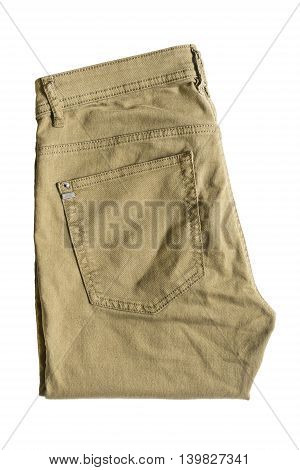 Folded khaki pants isolated over white background
