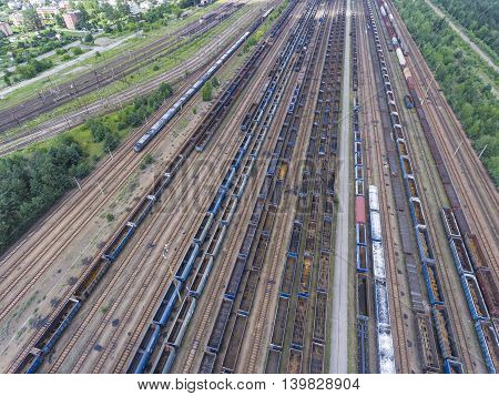 Depot With Many Railways At Day In City At Sunny Day. View From Above.