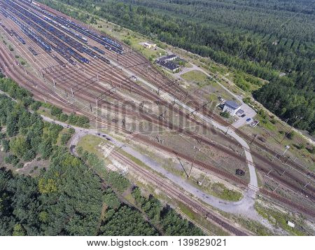 Depot With Many Railways At Day In City At Sunny Day. View From Above.