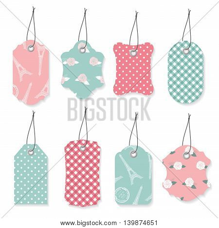 Cute textile label tags set in pastel blue and pink colors.