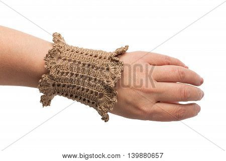 Knitted handmade brown bracelet isolated on white background