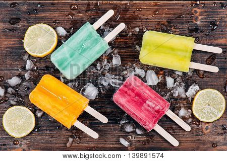 3 double ice cream on a rustic wooden background