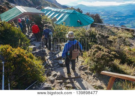 Ranau,Sabah,Borneo-March 13,2016:Group of climbers arrived from Low's Peak to Sayat Sayat check point after successfully completed conquering the mountain Kinabalu at Sabah Land Below The Wind.
