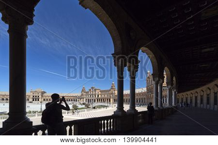 SEVILLE, SPAIN - September 13, 2015: Tourists at the Plaza de Espana (Spain Square) on September 13, 2015 in Seville, Spain