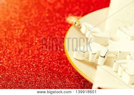 Christmas holiday background with plate and ornamnets