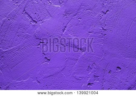 Wall painted in retro vivid purple texture