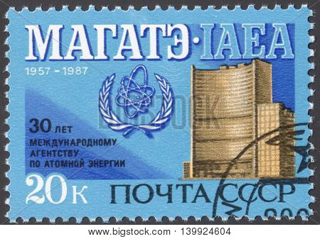 MOSCOW RUSSIA - CIRCA FEBRUARY 2016: a post stamp printed in the USSR devoted to the 30th Anniversary of International Atomic Energy Agency circa 1987