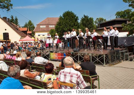 Buchlovice, Czech Republic, July 23, 2016: Celebration of garlic. Traditional farmers harvest celebrations of garlic. Agricultural sales markets. Sales of garlic, performances by folk ensembles.