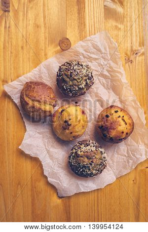 Homemade salty muffins also called proja pie traditional Balkans baked food with savory cheese ham eggs and paprika made of corn flour starch selective focus.