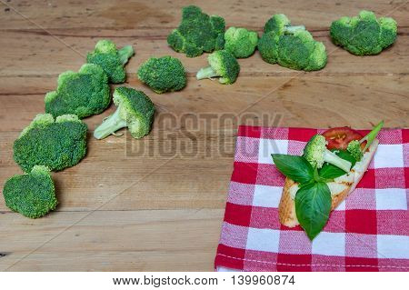 Sandwich with broccoli and tomato and basil. Broccoli. Green broccoli