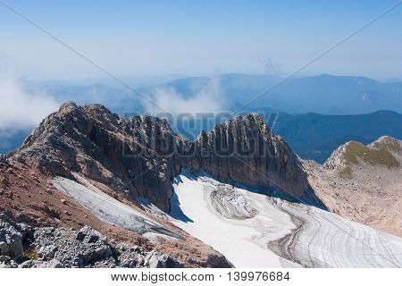 view of the glacier and rocks from the mountain tops Caucasus landscape.