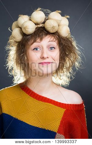 Beautiful rumpled woman wearing a vegetable torse