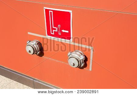 Water Valve Tank Of Fdc (fire Department Connection) And Warning Sign On The Wall Of Building