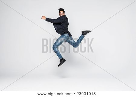 Excited Indian Businessman Jumping For Joy Isolated On White Background.