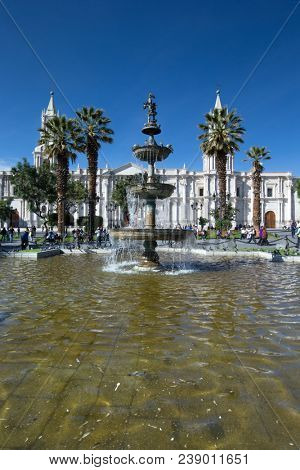 AREQUIPA PERU NOVEMBER 9: Main square of Arequipa with church on november 9 2015 in Arequipa Peru. Arequipa's Plaza de Armas is one of the most beautiful in Peru.