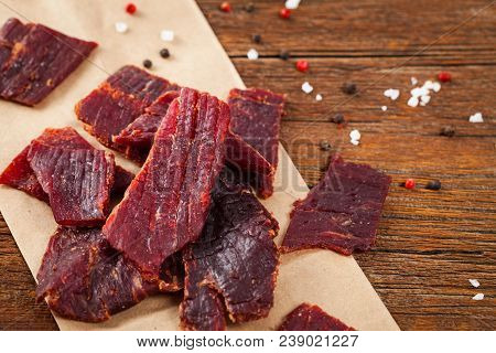 Delicious Homemade Beef Jerky Background. Selective Focus.