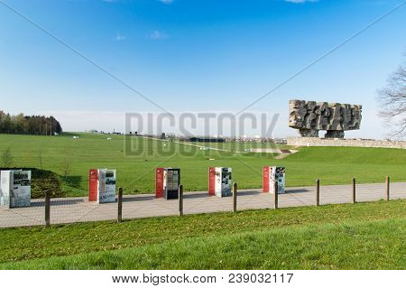 Lublin, Poland - April 14, 2018: Barbed Wire Fence Of Kl Lublin And Monument At Majdanek To Struggle