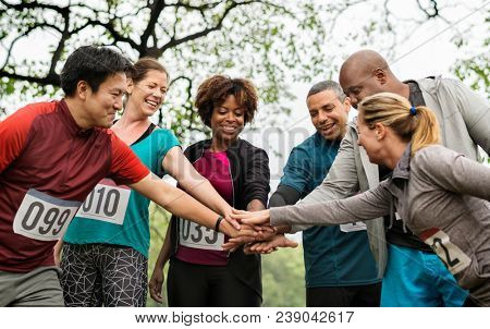 Team of diverse people ready for a race