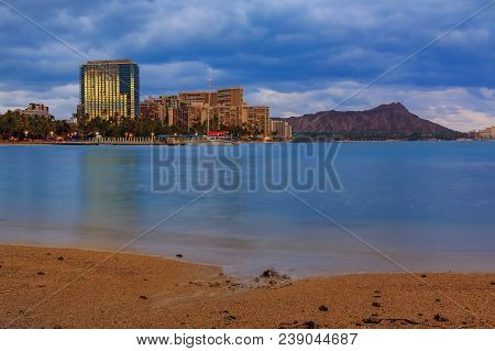 Waikiki Beach And Diamond Head In Honolulu At Twighlight In Hawaii, Usa
