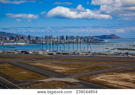Aerial View Of Downtown Honolulu, Diamond Head And The Runway Of Daniel K. Inouye International Airp