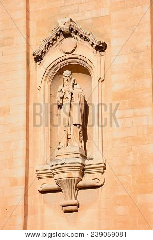 Religious Statue On The Front Of Naxxar Parish Church, Naxxar, Malta, Europe.